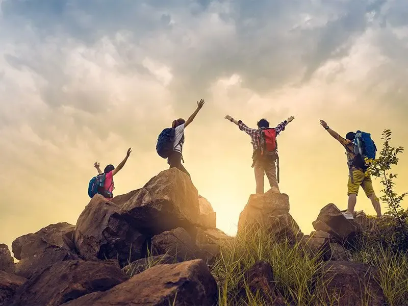 Travellers outdoors in a photo used on Dandeli Safari